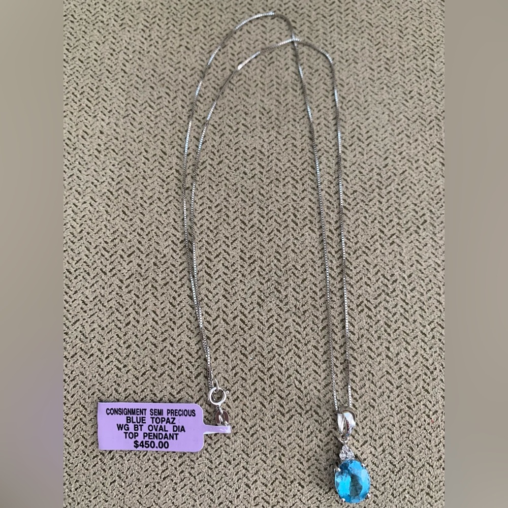 Blue Topaz Oval Pendant with Diamonds set in 14k White Gold